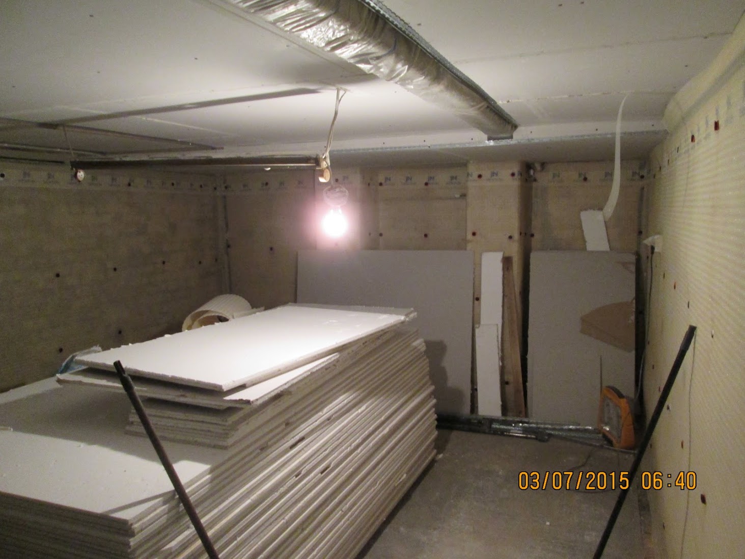 Cavity-drain membrane fixed to cellar walls