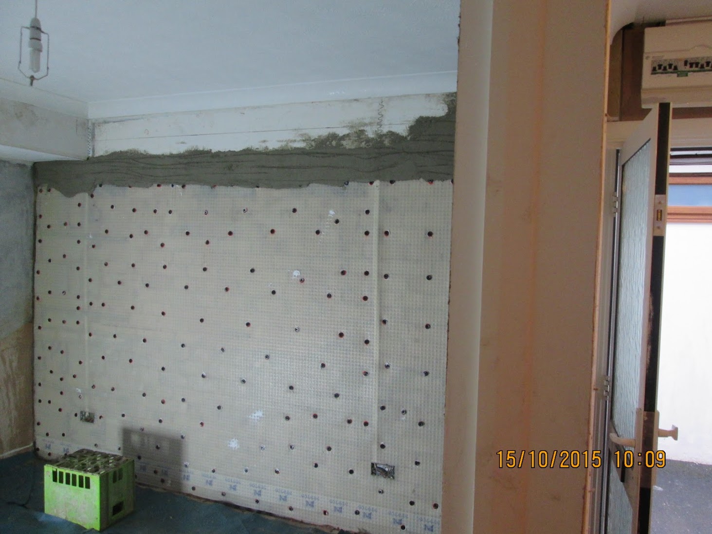 Full-height membrane before dry-lining