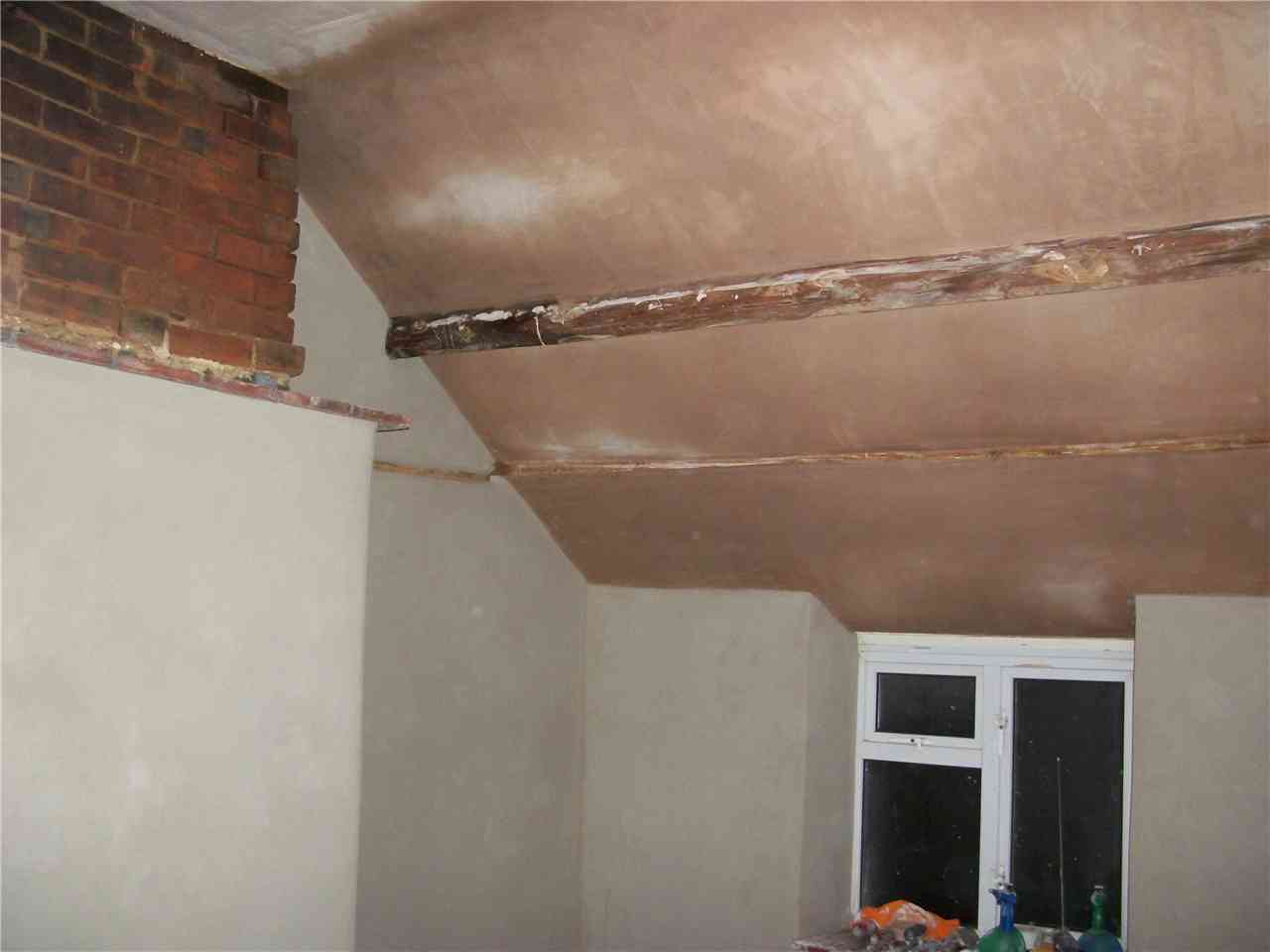 Lime finish around a structural beam