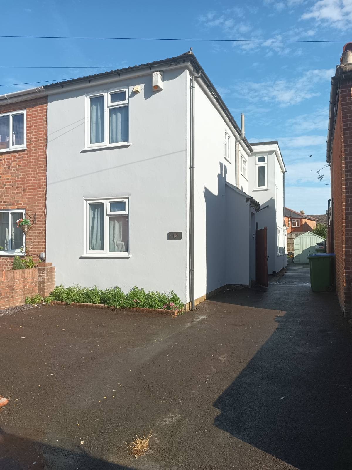 After — Cracked, damp-stained elevation re-rendered